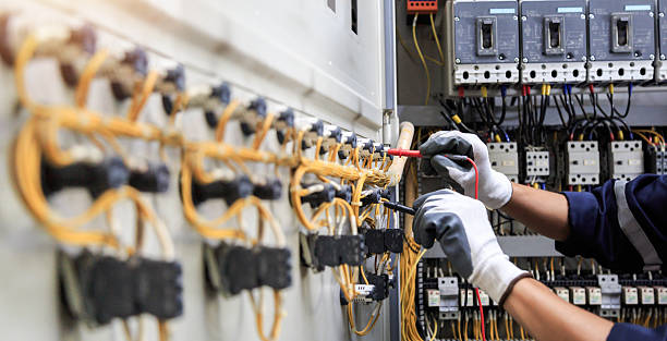 Professional Electrician technician working in Surf City, NC